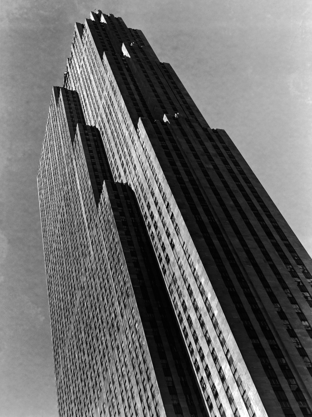 Low angle view of the RCA Building (later the GE Building) at 30 Rockefeller Plaza in the Rockefeller complex, New York, New York, April 1938. (Photo by Hulton Archive/Getty Images)