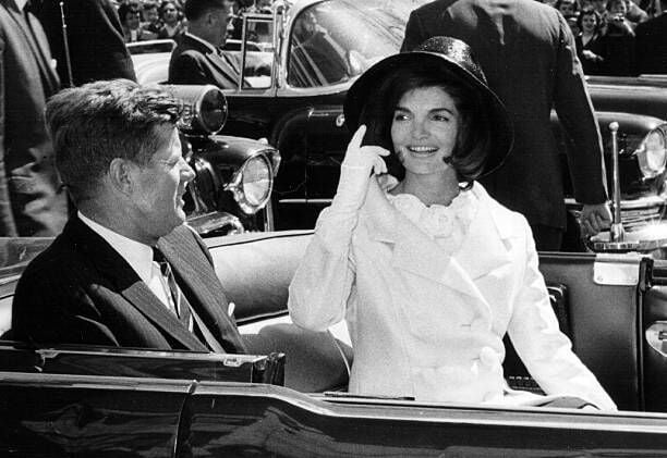 381091 71: President John F. Kennedy and First Lady Jacqueline Kennedy ride in a parade March 27, 1963 in Washington, DC. (Photo by National Archive/Newsmakers)