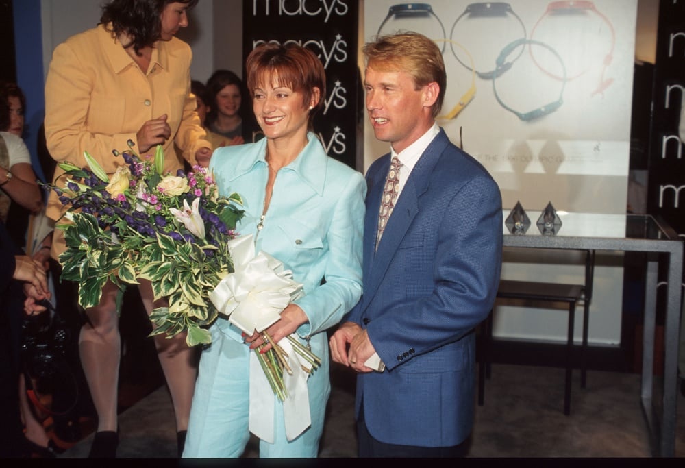 273996 08: Olympic Gold Medalists Nadia Comaneci and new husband Bart Conner promote a new commemorative Swatch collection at Macy