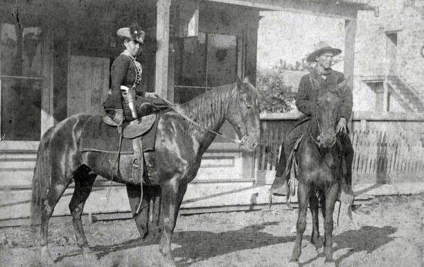 Outlaw And Bandit Queen Belle Starr,, 1886. Belle Starr, Sitting Side Saddle On Her Horse She Is Wearing A Single Loop Holster That Has A Pearl Handled Revolver In It, A Riding Crop In Her Left Hand And Is Wearing Leather Gloves. Outlaw And Bandit Queen Belle Starr. (Photo by Roeder Brothers/Buyenlarge/Getty Images)