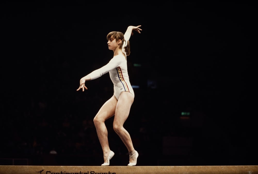 Nadia Comaneci of Romania performs her routine on the Balance Beam during the Women
