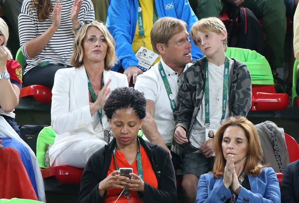 RIO DE JANEIRO, BRAZIL - AUGUST 11: Nadia Comaneci, her husband Bart Conner and their son Dylan Conner attend the Women