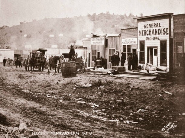 Main Street, Manhattan, Nevada, early 1900s. The town of Manhattan was founded in 1867 when silver was discovered nearby. When gold was found in 1905 over 4000 people moved into the area. Artist Unknown. (Photo by Historica Graphica Collection/Heritage Images/Getty Images)